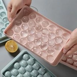 Promo ⭐ Innovatique Ronde Ijsblokjesvorm Met Deksel - 2 Stuks - Roze - 66 Ronde Mini Ijsblokjes - ø 1,5cm - Stofvrij - Plooibaar - Bioplastic - Ice Cube - Makkelijk Te Vullen - Zonder Morsen ⭐